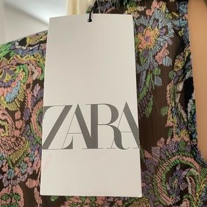 A brand new Zara dress you can wear to any event. Never been worn ever. Has tags